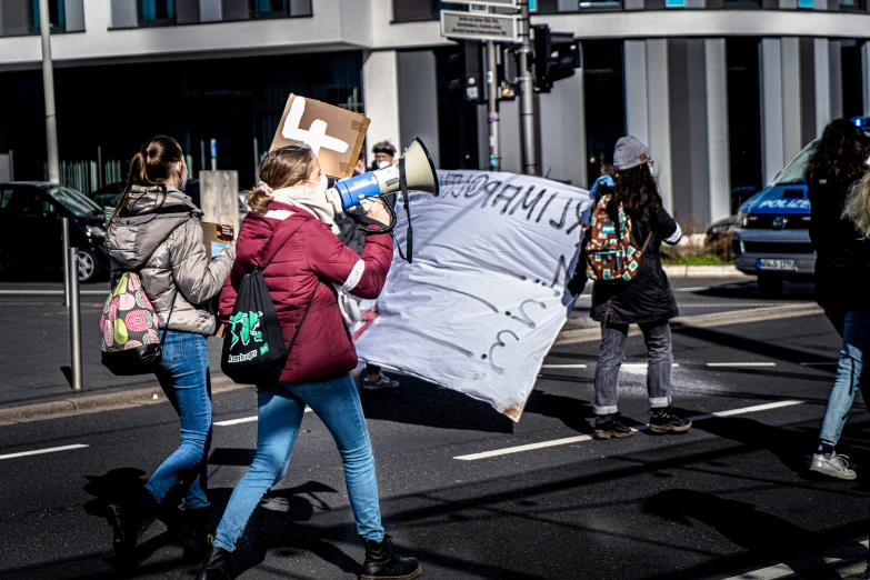 a protest for nurses marching down the street