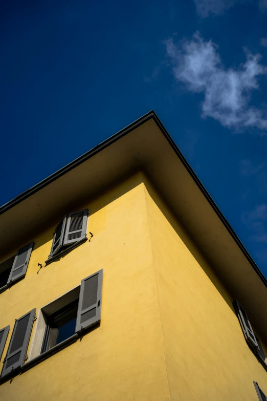 the windows on a large building are open