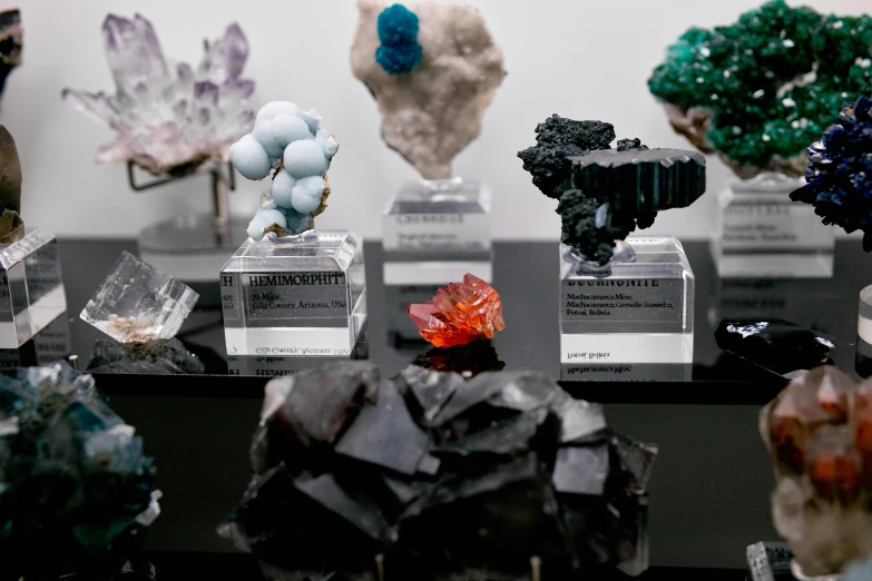 multiple glass stones and crystals on a table