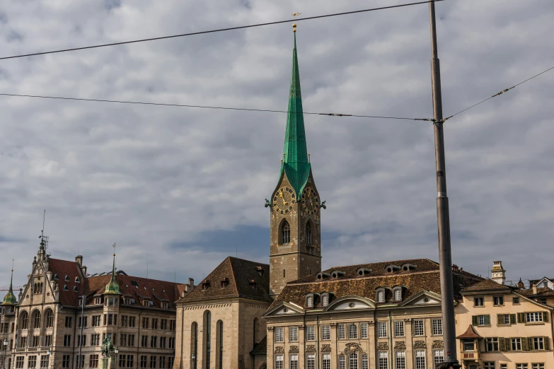 a view of an old church with a spire