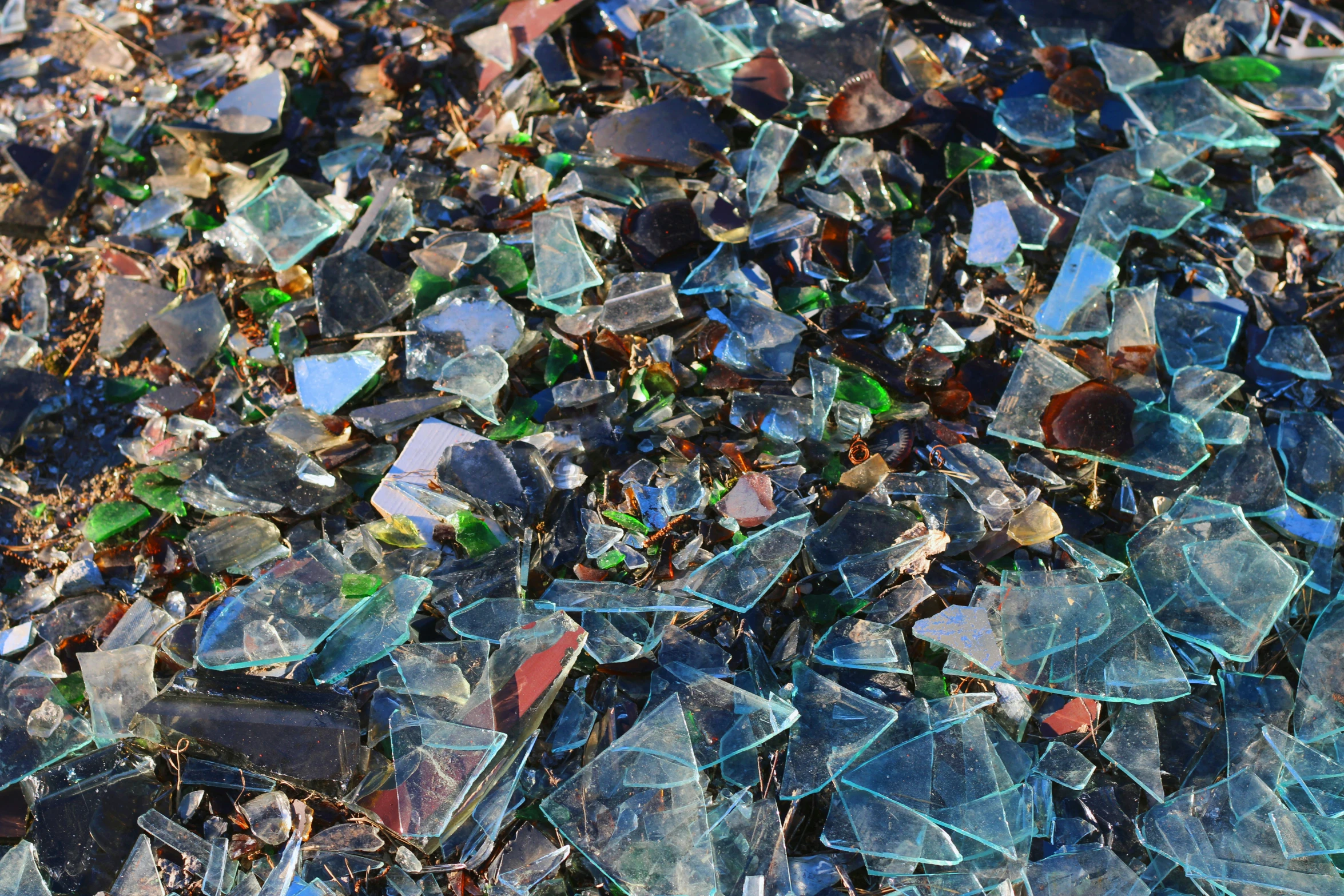 broken glass chips or glass shards on the ground