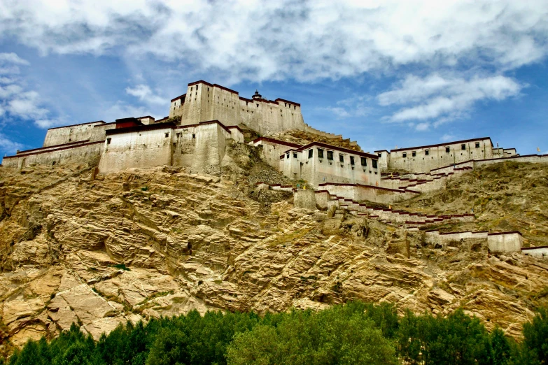 a view of the great wall of china on top of a mountain