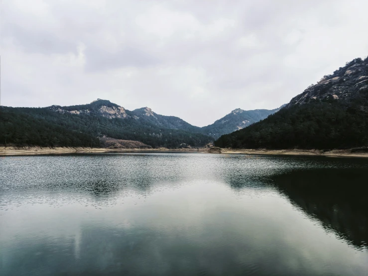 the large lake is still surrounded by mountains