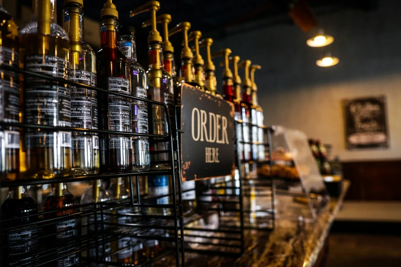 a row of bottles of alcohol at a liquor shop