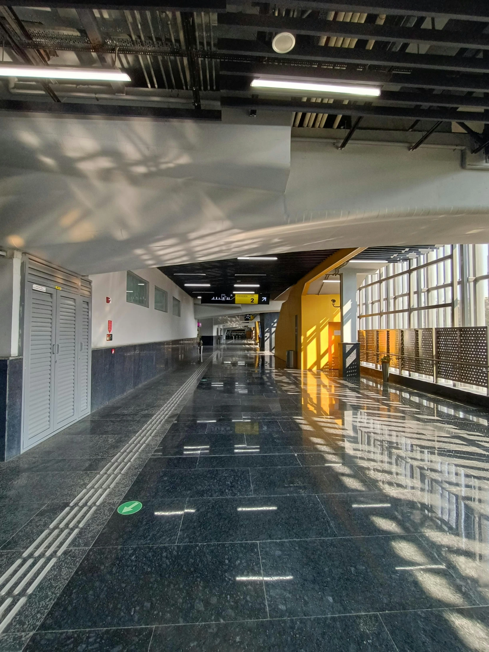 a view of an airport hallway from a hallway