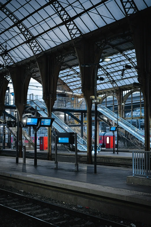 a train station with many rows of trains