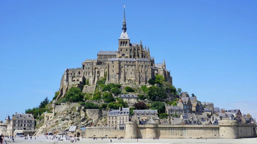 a castle near a beach on a sunny day