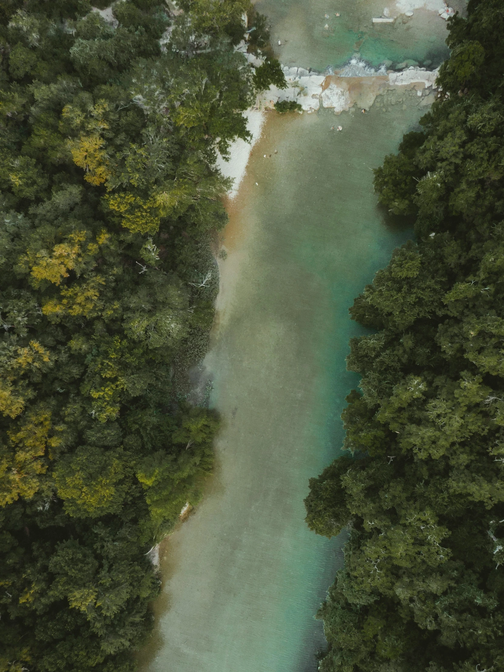 a river that has several rocks in it