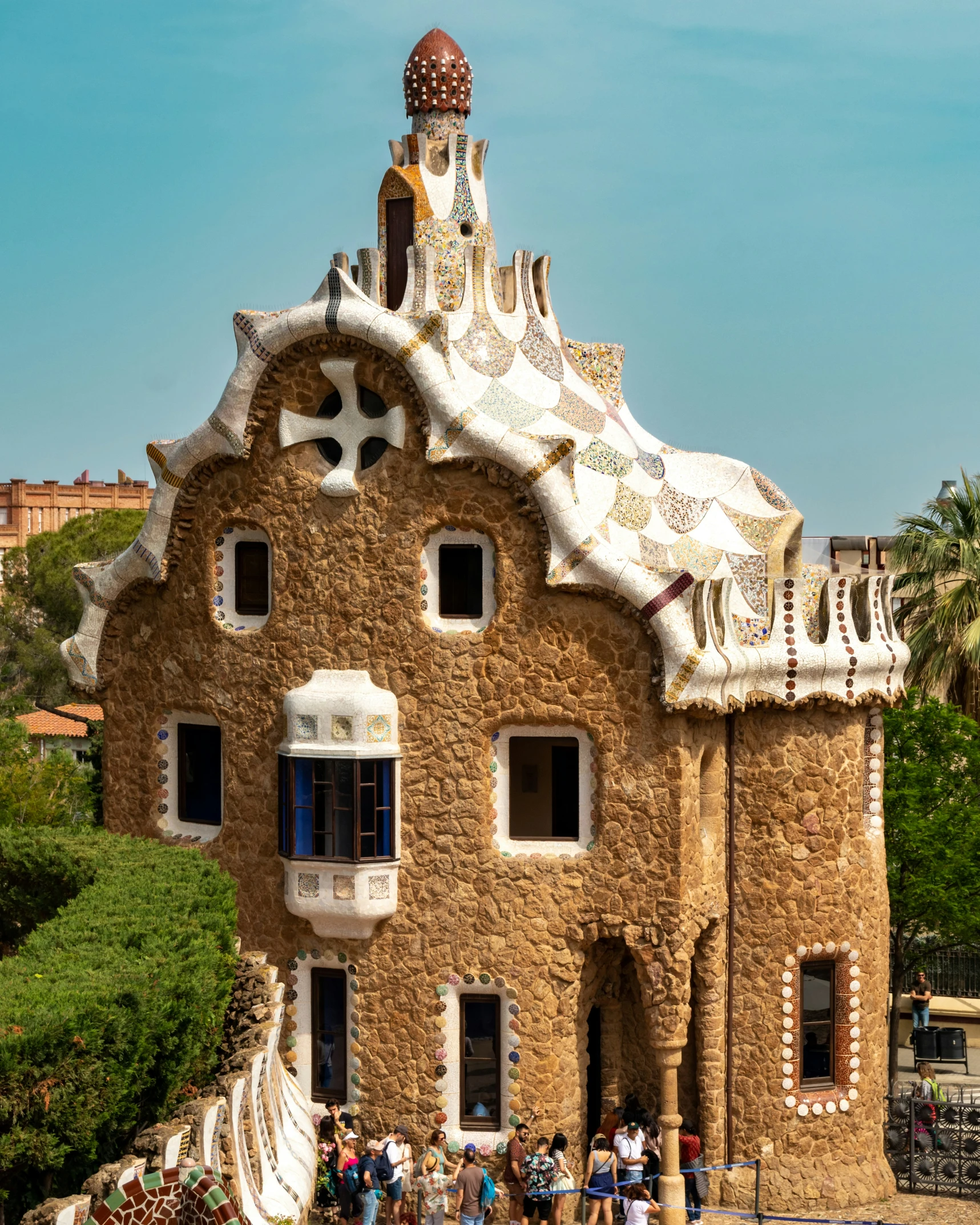 a large building with a tower made of fake stone