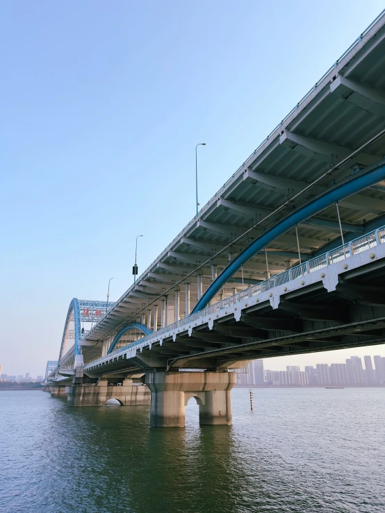 view of the blue bridge on the water