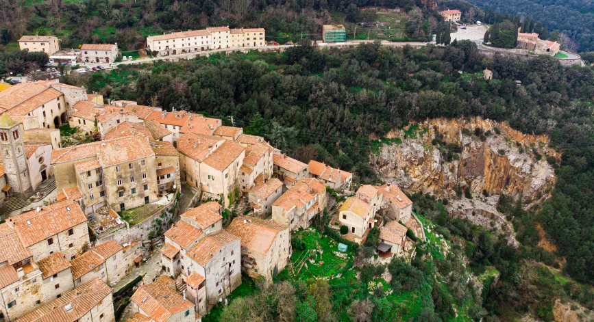 a aerial po of a village in the mountains