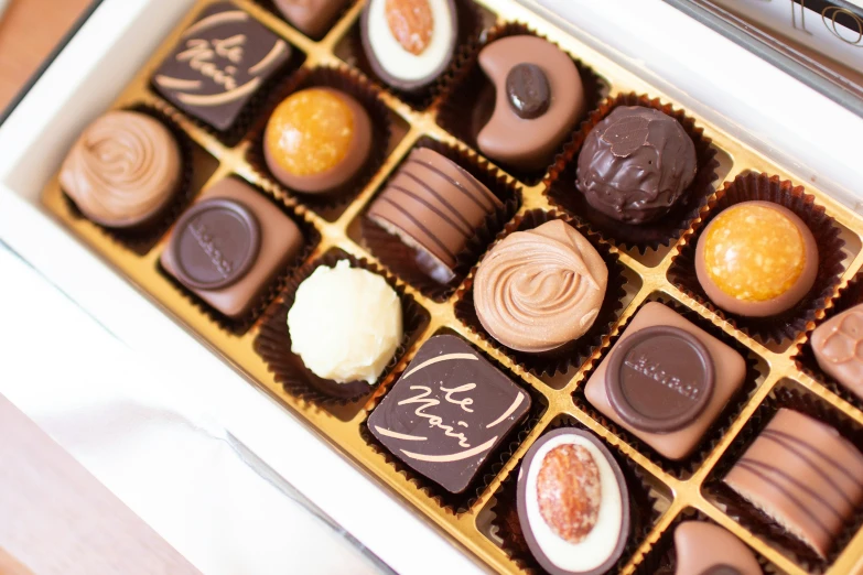 a large box full of different types of chocolates