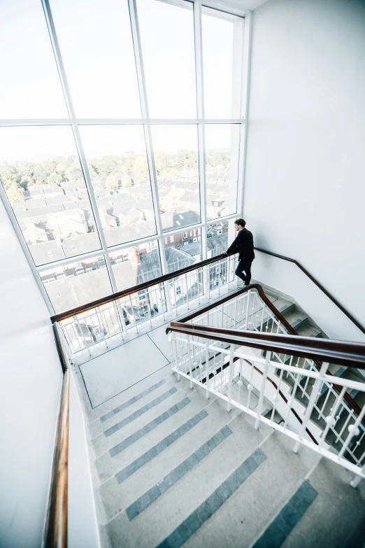 a man walking up a flight of stairs