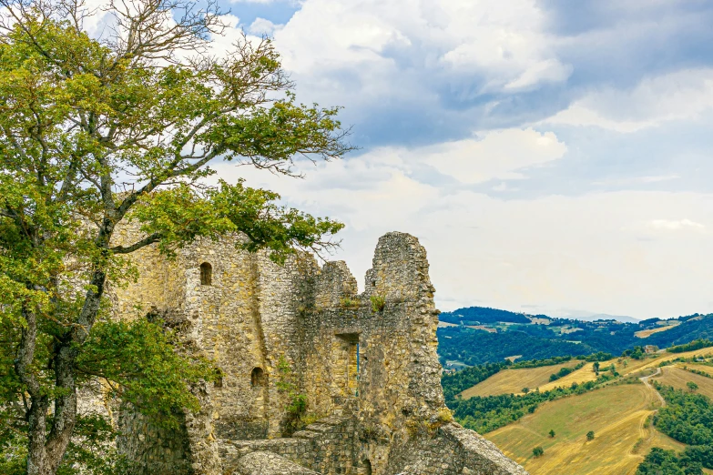 the castle overlooks its beautiful landscape on a cloudy day