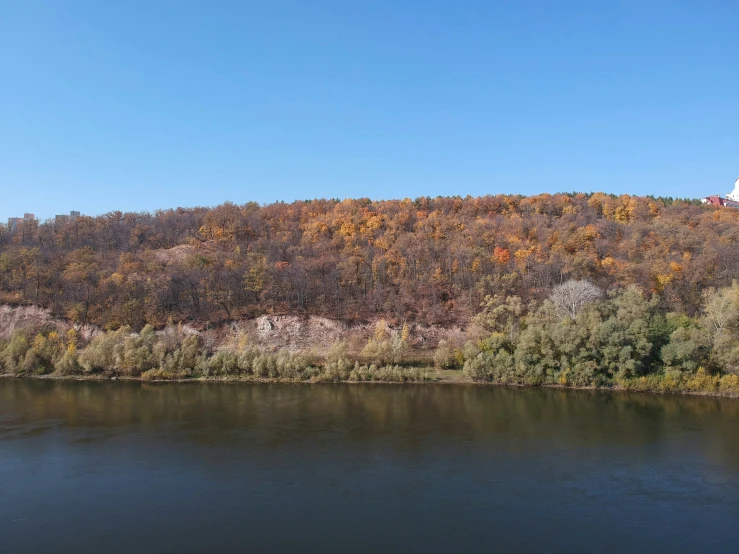 the land is surrounded by a river bank