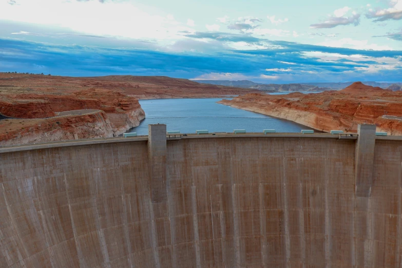 a large, long wall is overflowing water