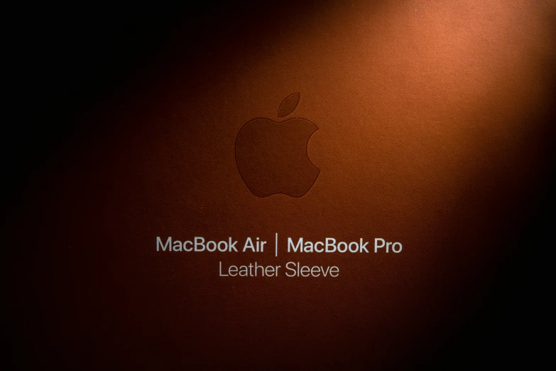 the apple logo has a dark brown background