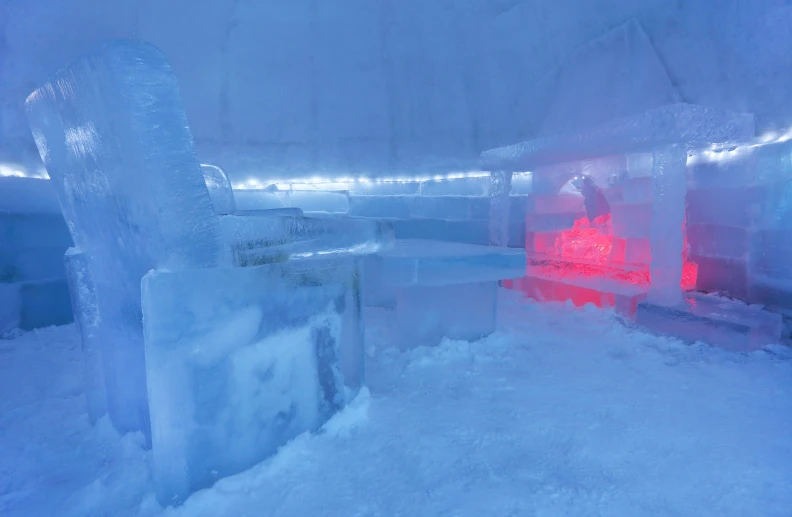 ice sculptures with neon lights in the snow