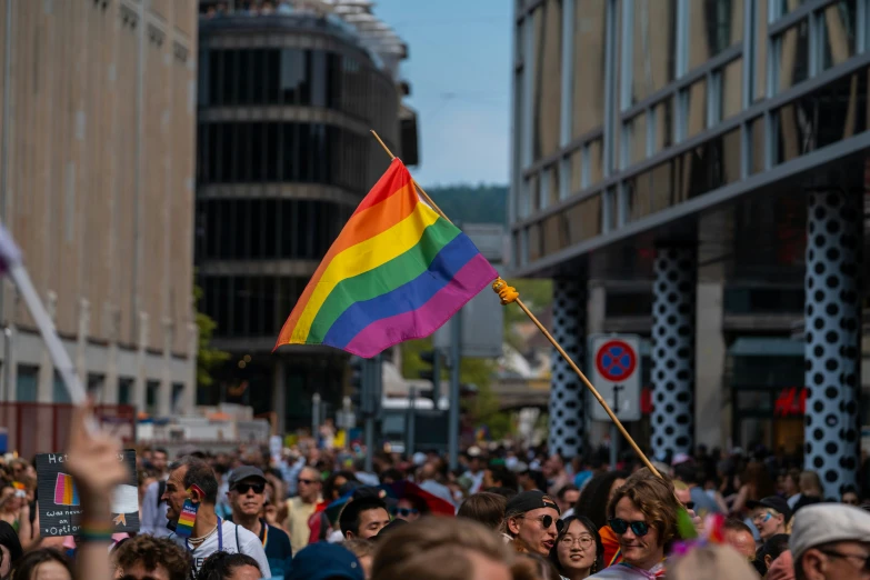 there is a large crowd of people in this street