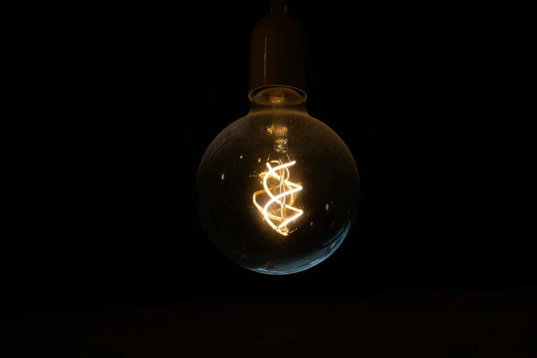 a light bulb with some string on the inside