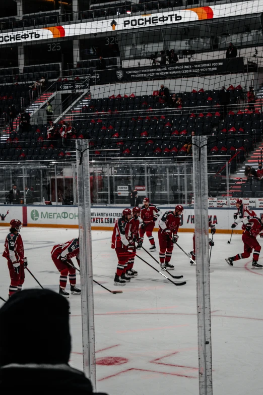 two teams in a hockey game on the ice