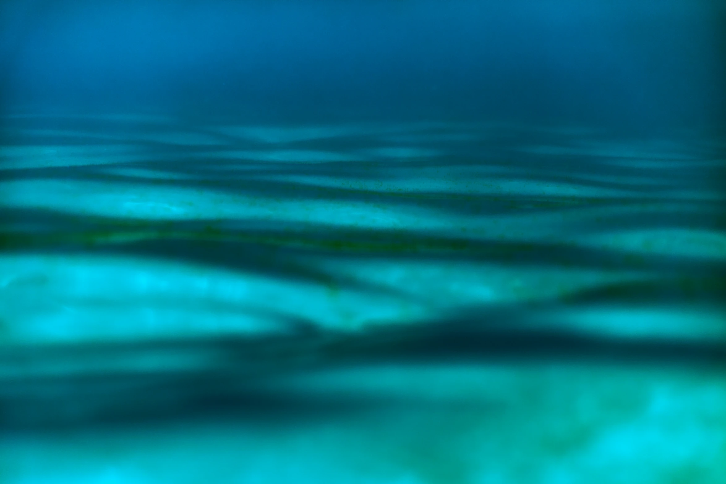 view of wavy, blue water on an ocean surface