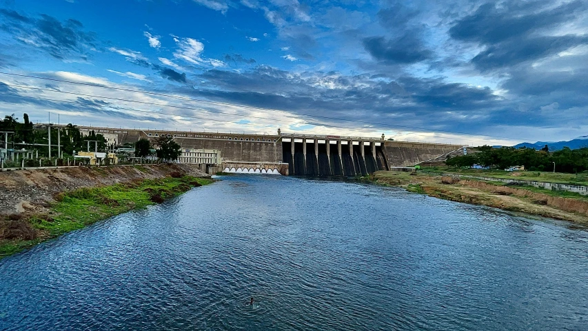 water flowing from a dam to the ground