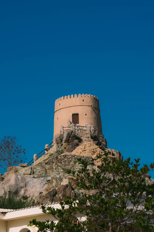 an old stone tower building with no top