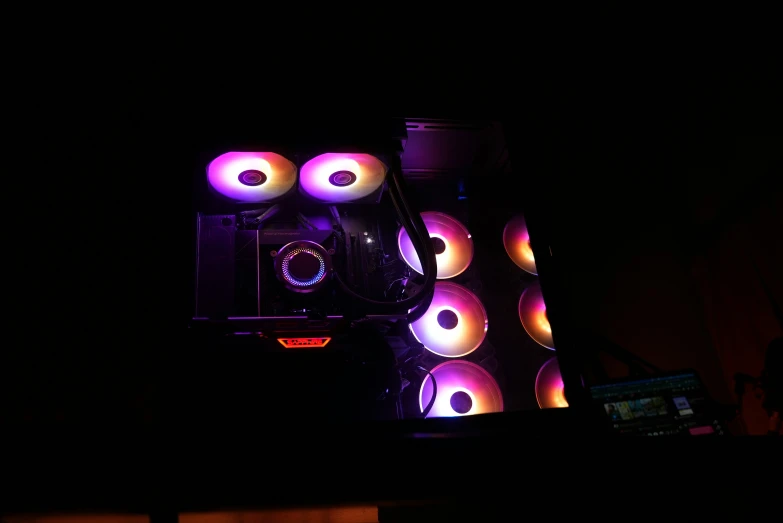 the speakers are all stacked up and glowing