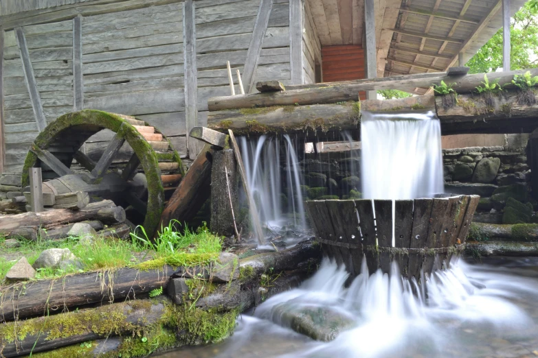 water flowing from a well into a stream