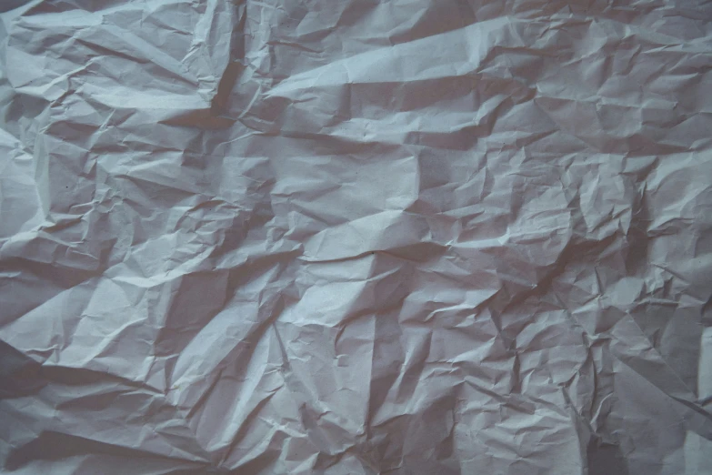 an image of torn up pieces of white paper