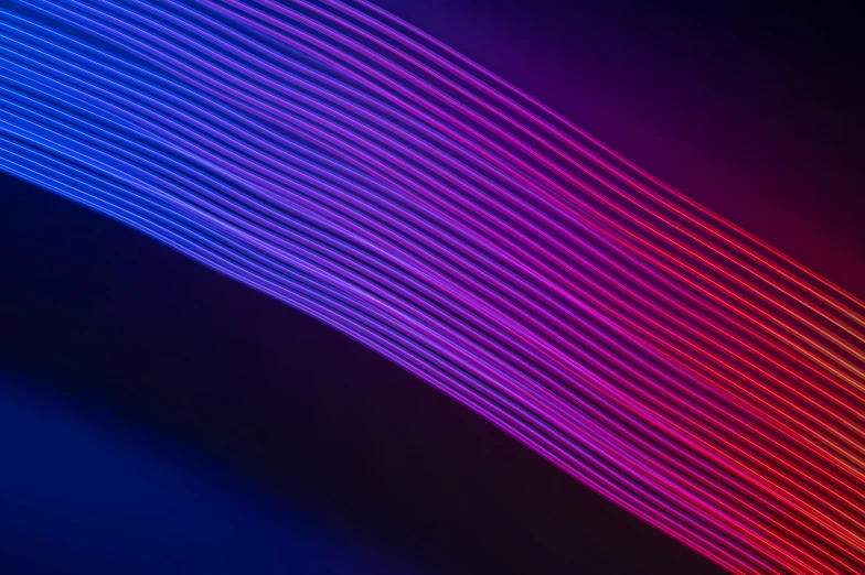 a large wall with lines in purple and blue