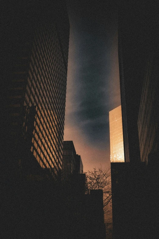 an image of a city at night taken from a moving vehicle