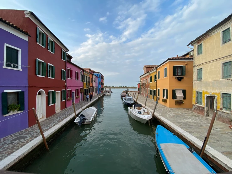 a street view with boats parked along it