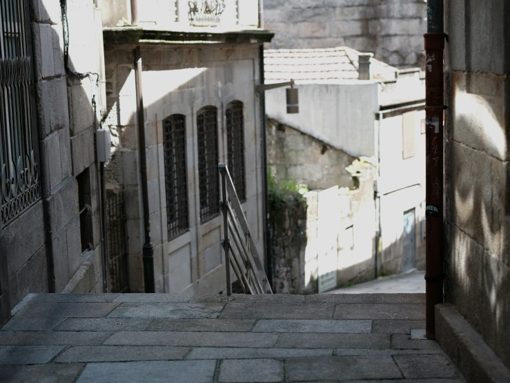 an empty walkway in an old part of town