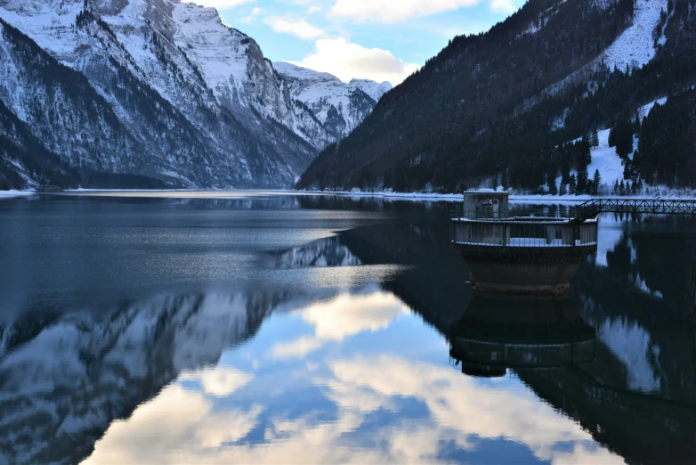 a boat parked next to a large body of water