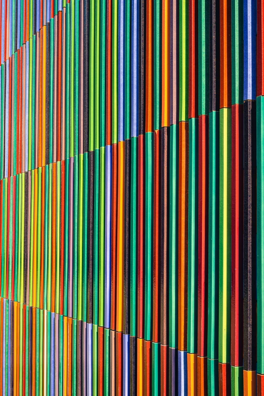 some colorful lines are going together on a wall