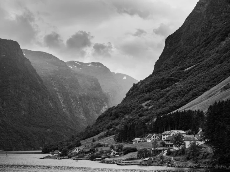 an image of a scenic mountain range with many houses in it