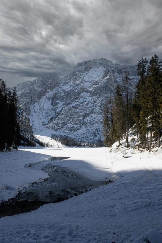 a snowy landscape is shown at the bottom of a mountain