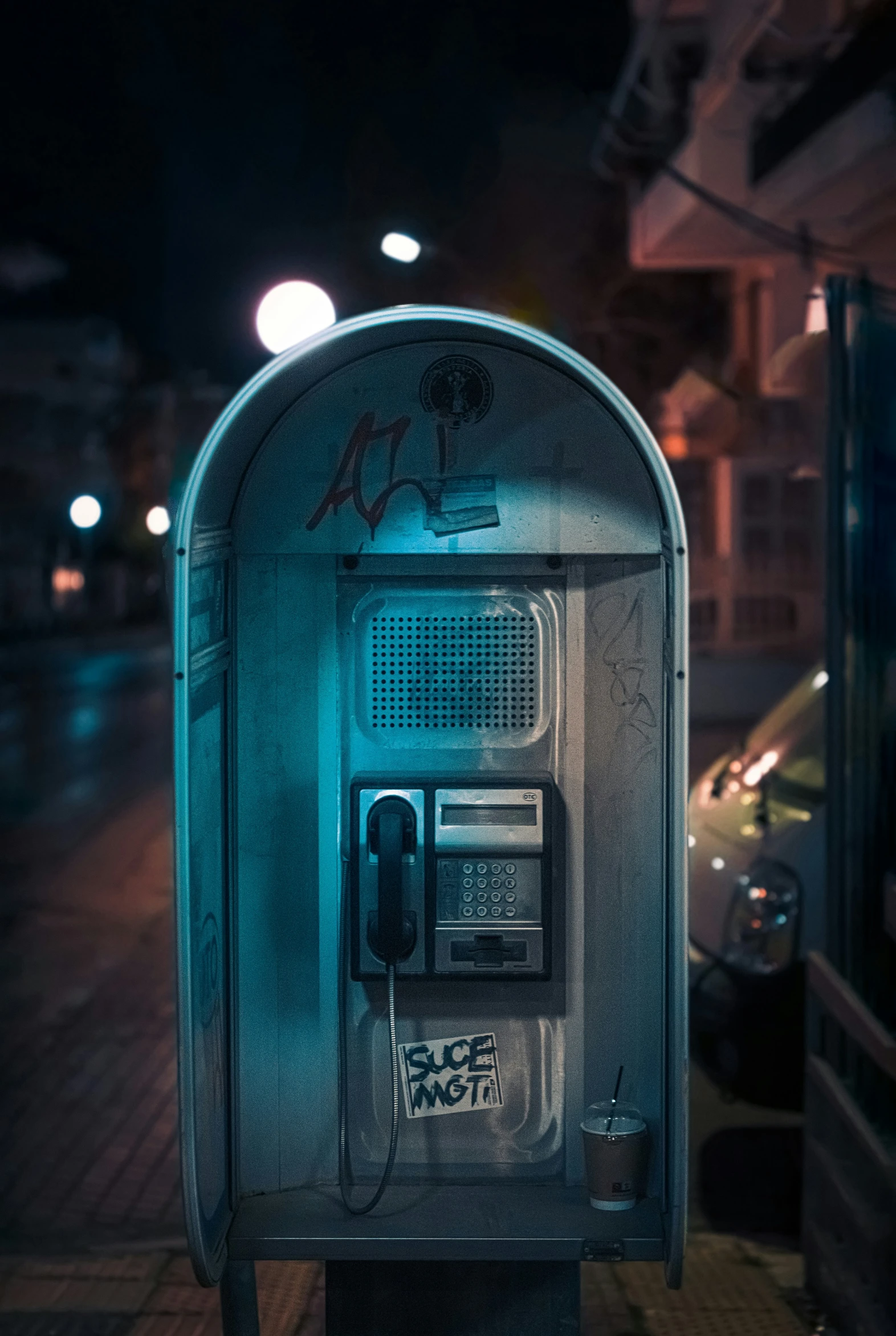 an empty street near a parking meter and the street