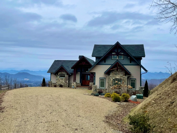 a big house that is next to some trees