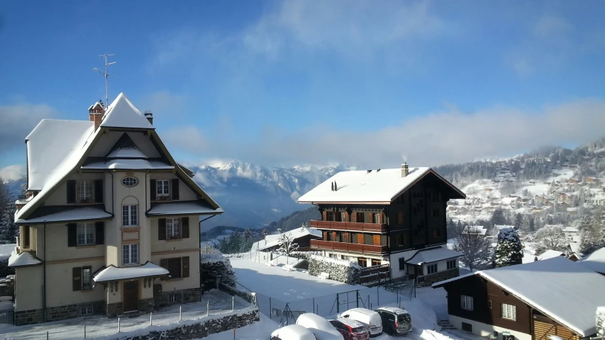 a po taken of some houses in a snowy area