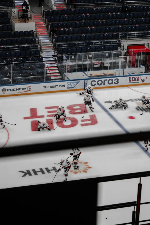 a hockey team playing an ice hockey game