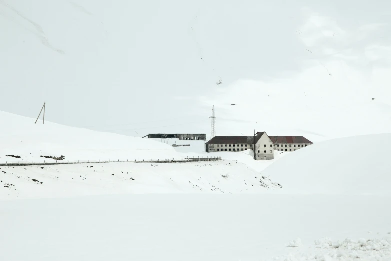 two buildings that are sitting in the snow