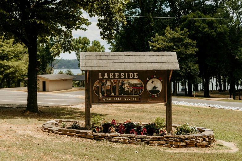 there is a sign for lakeside winery, in the yard