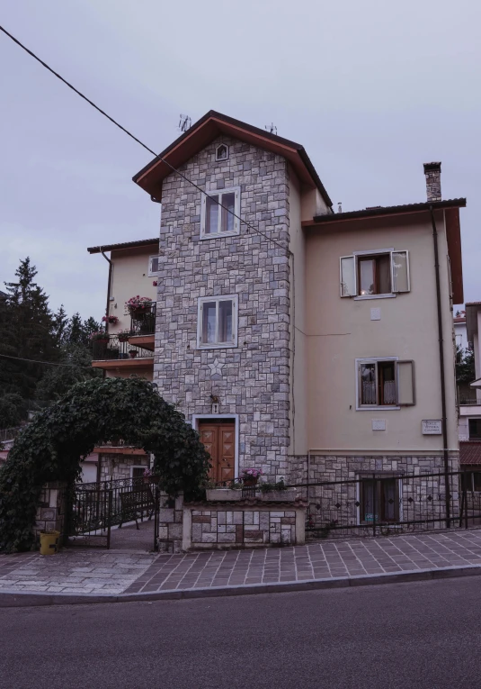 a house with a very large door and many windows