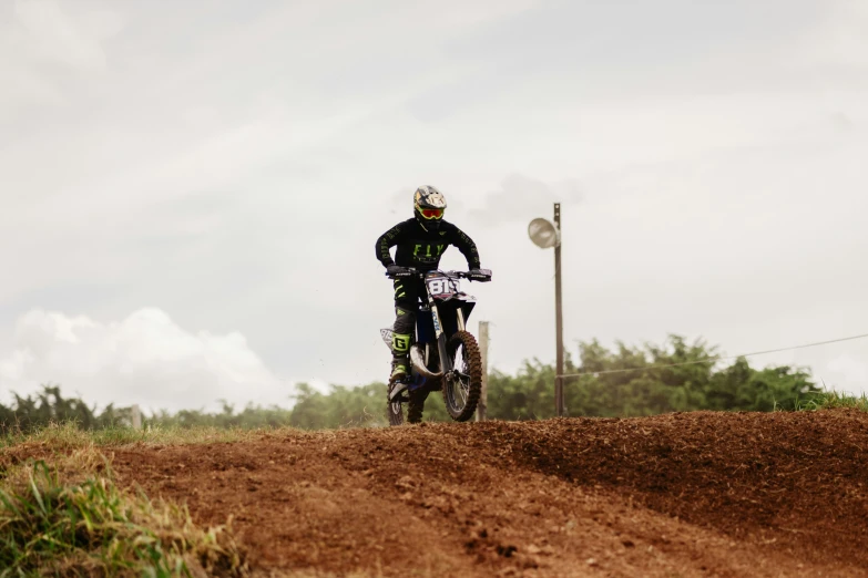 a person on a dirt bike doing a trick