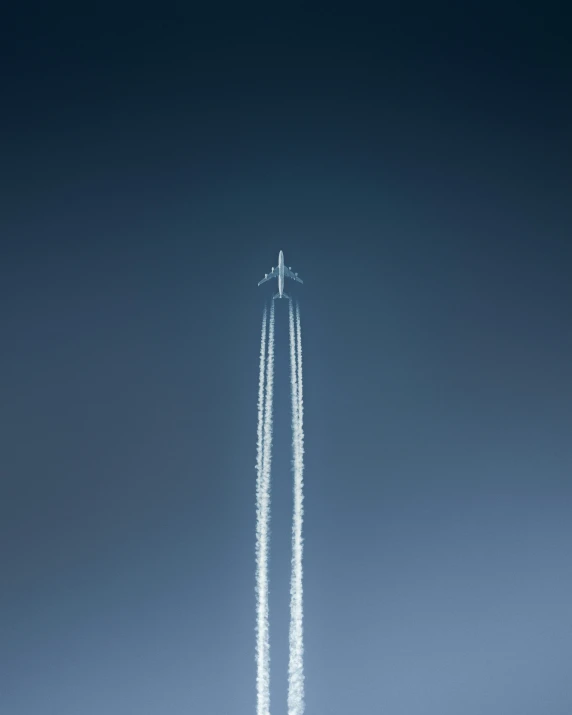 jet in air, with clouds coming up