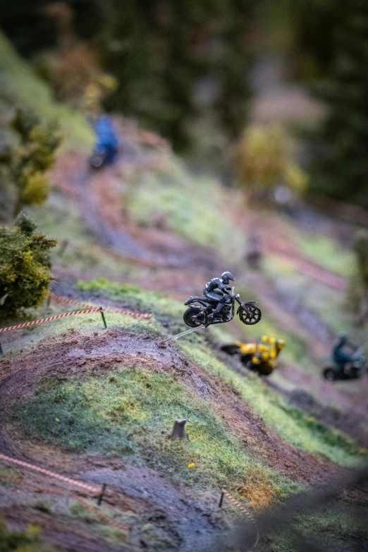 a blurry view of a bike race on the trail