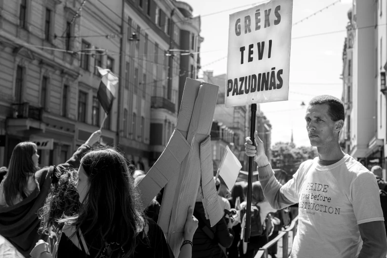 people marching in the street protesting for a political party